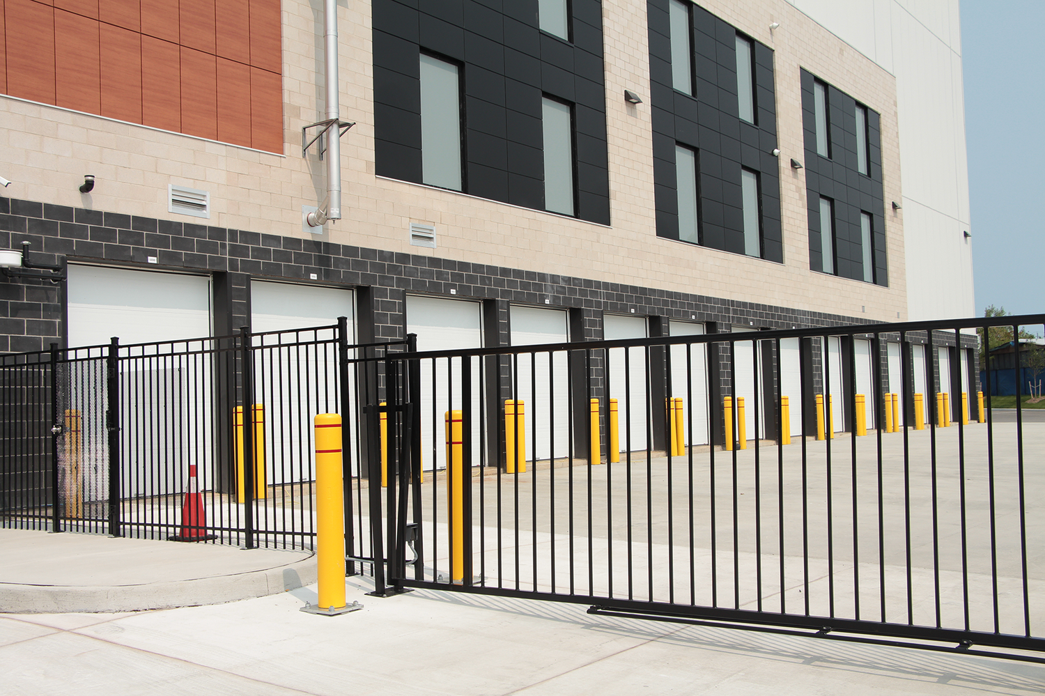 A security gate in front of a self-storage facility